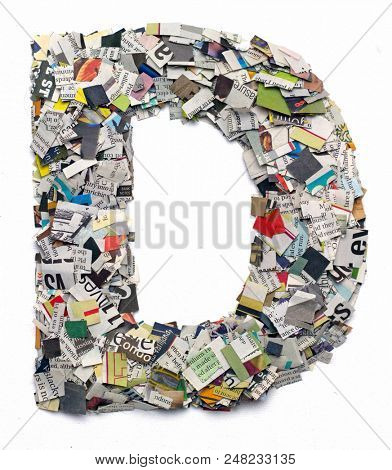 Letters made from newspaper capitel D isolated on white 