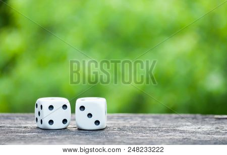 White Dice On A Green Blurry Background, Playing Dice Macro Photos