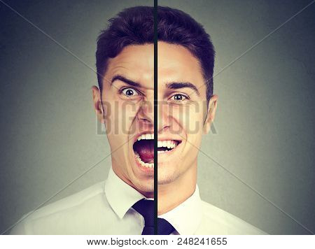 Bipolar Disorder. Business Man With Double Face Expression Isolated On Gray Background