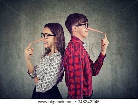 Young Couple Of Cheaters, Satnding Back To Back Two Liars