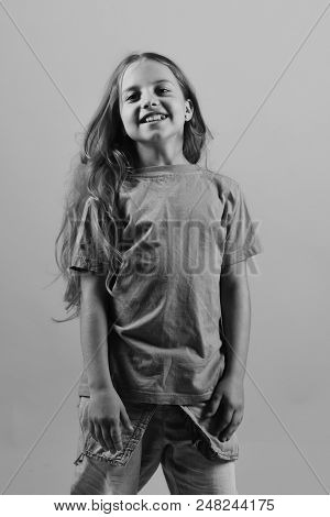 Child Looks Like Hip Hop Star Wearing Casual Clothes. Kid Poses As Bgirl In Cool Style. Childhood An