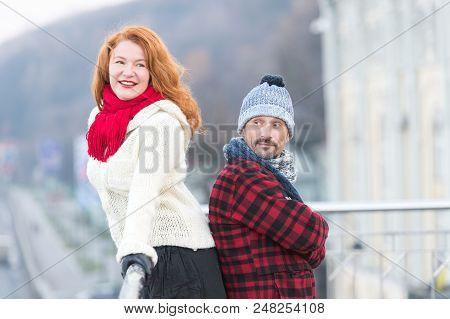 Urban Couple On The Bridge. Happy Couple Standing Back To Back. Men And Woman Look In One Way. Smili