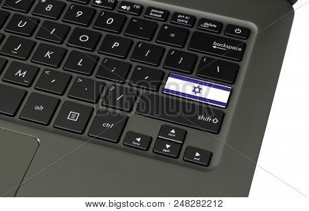 Flag Of Israel On Laptop Keyboard, Close-up.