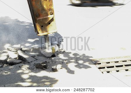 The Road Drilling Machine Are Digging Road Surface.