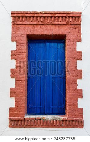 Omodos, Cyprus. May 2018. A Typical View Of An Old Building With Old Doors In The Traditional Villag