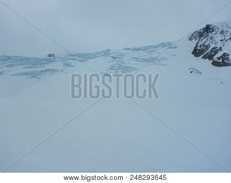 Crevasses And Seracs On A Glacier