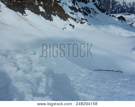 Shade Of A Mountaineer On Skis