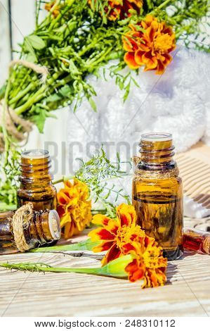 Nettle Tincture In A Small Bottle And Fresh Leaves On White Wood, Medicinal Herb For Overweight, Dia