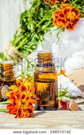 Nettle Tincture In A Small Bottle And Fresh Leaves On White Wood, Medicinal Herb For Overweight, Dia