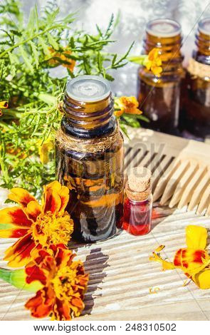 Nettle Tincture In A Small Bottle And Fresh Leaves On White Wood, Medicinal Herb For Overweight, Dia