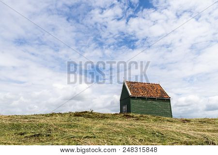Schokland, Netherlands - June 23, 2018: Small, Wooden, Green House On Former Island Schokland, Unesc