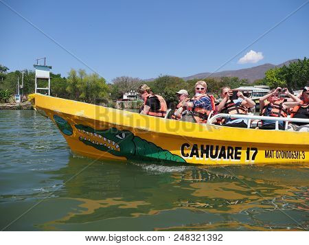 Tuxtla, Mexico North America On February 2018: Yellow Motor Boat And Group Of Tourists, Grijalva Riv