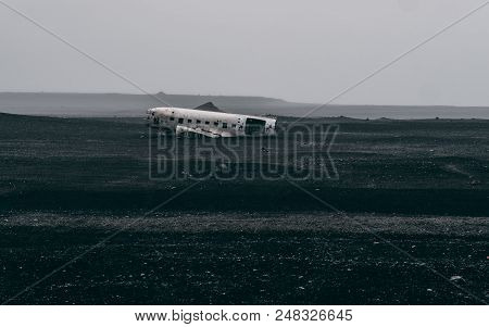 Plane Wreck In Iceland At A Foggy Day With No People