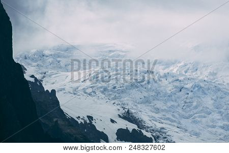 Glacier In Iceland On A Mountain Covered In Clouds Tele Lens