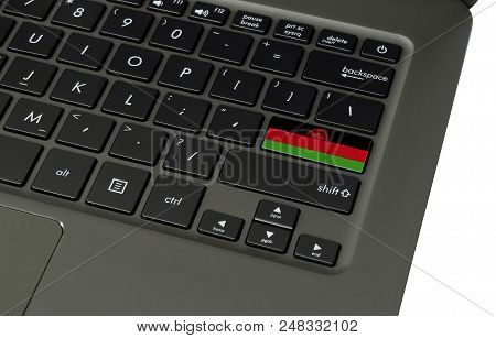 Flag Of Malawi On Laptop Keyboard, Close-up.