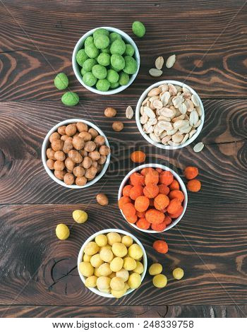 Assortment Of Different Peanuts Snack For Beer, Wine, Party. Salted Peanuts, Peanuts In Coconut Glaz