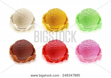 Set Of Ice Cream Scoops Of Different Colors And Flavours With Berries, Nuts And Fruits Decoration Is