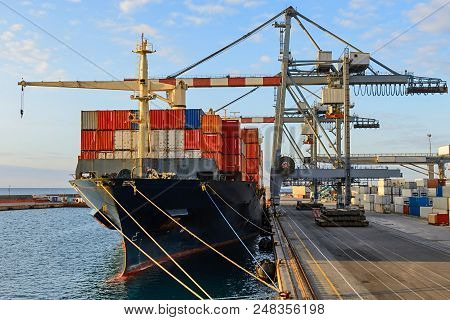 Container Ship Moored At Port  Loading In Progress