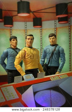 JUL 5 2018: Recreation of a scene from the 1960s television science fiction show Star Trek, where Captain Kirk Doctor McCoy & Mr. Spock beam down to the planet surface - Art Asylum action figures