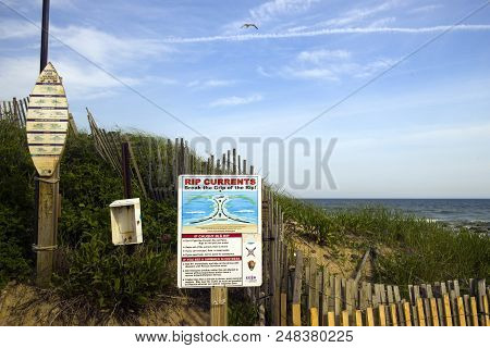 Montauk, New York-june 8:  Rip Current Warning And Surfer Rules Signs Are Seen On Ditch Plains Beach