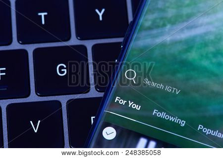 New York, Usa - July 6, 2018:igtv Search Menu    Menu On Smartphone Screen Lay On Laptop Keyboard