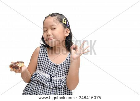 Little Happy Cute Girl Is Eating Donut Isolated