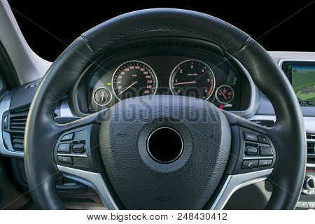 Modern Luxury Car Inside. Interior Of Prestige Modern Car. Black Perforated Leather Cockpit. Steerin