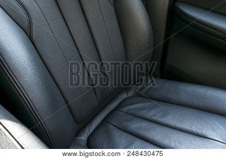 Modern Luxury Car Black Perforated Leather Interior. Part Of Leather Car Seat Details. Modern Car In