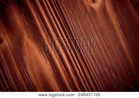 Old Dark Cherry Wood Background. Red Wooden Board Plank Texture. Beautiful Natural Rustic Photo Back