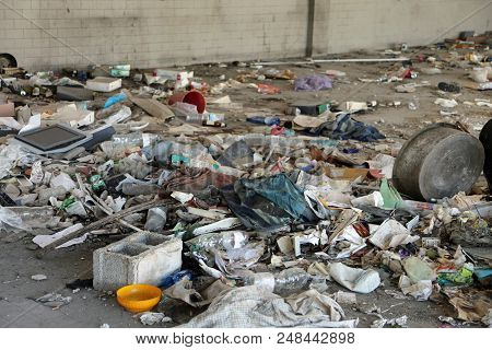 Homeless Shelter Without People And Many Broken Objects And Dirty Rags