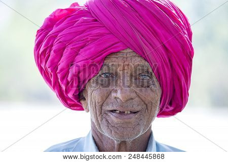 Ellora, India - February 01, 2017 : Unidentified Portrait Of An Indian Man In Red Turban, Who Visite