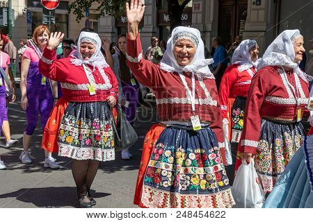 Prague, Czech Republic - July 1, 2018: Women In Folk Costumes Parading At Sokolsky Slet, A Once-ever