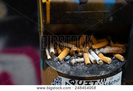 Close Up Cigarette Butts Discarded On Ashtray. No Smoking And Stop Smoking Concept.