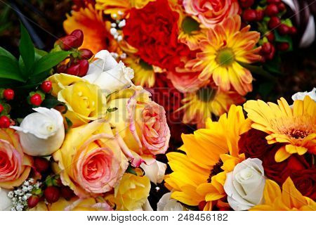 Flower Bouquets With Yellow, White, Red Roses, Sun Flowers And Rose Buds