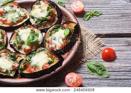 Mini Pizza With Eggplant , Tomato And Basil