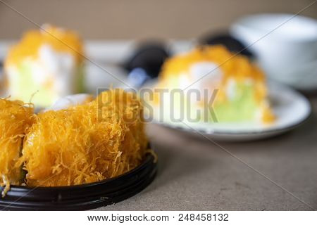 Close Up Selective Focus Piece Of  Gold Egg Yolk Thread Cake , Or  'cake Foi Tong