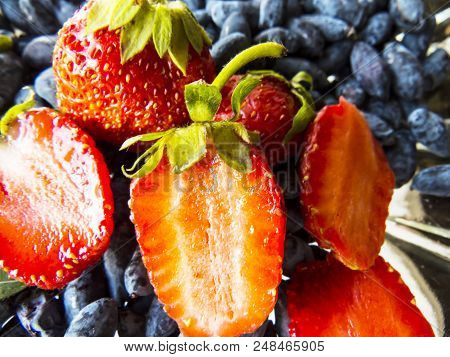 Beautiful Strawberry On A Wooden  Background. Organic Bckground