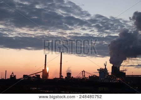 Ijmuiden, The Netherlands - July 5th 2018: Tata Steel Company In Ijmuiden By Sunset