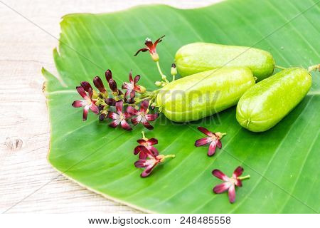 Averrhoa Bilimbi Fruit With Flowers On Banana Leaf