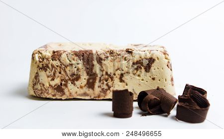 Halva With Cacao Pieces On White Background
