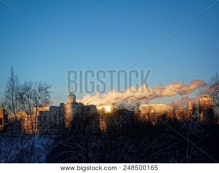 Modern Building In Moscow In Winter, Against The Blue Sky