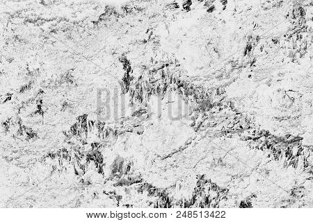 Abstract Black And White Background. A Nonuniform Textured Surface