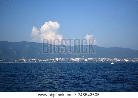 Gelendzhik, Russia - June 27, 2018: The View Of The Town And Markotkh Ridge From The Sea