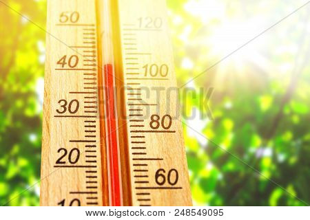 Thermometer Displaying High 40 Degree Hot Temperatures In Sun Summer Day