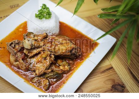Basque Style Spicy 3chicken And Vegetable Casserole Stew Meal On Wooden Table