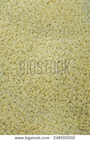 Image Background Of Raw Flour Product Short Vermicelli. Background Of Vermicelli. Pasta. Vertical Ph