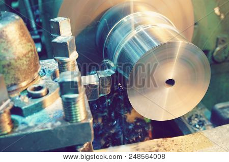 Shavings On The Details Close-up. Lathe, Metal Processing By Cutting On Industrial Equipment. Tinted