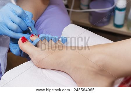 Woman Feet Receiving Pedicure. Close Up Concept