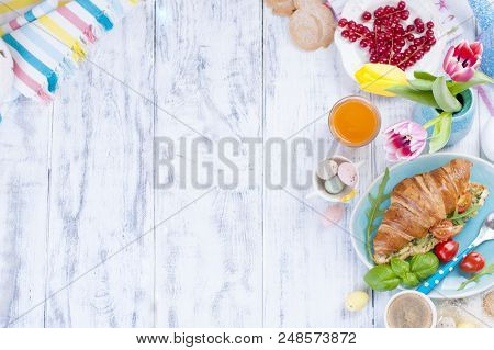 Easter Breakfast Flat Lay With, Bread Toast With Fried Egg And Gre, Colored Quail Eggs And Spring Ho