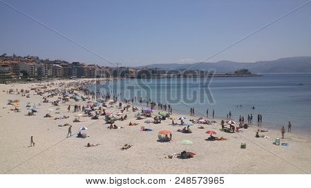 People At Urban Beach Of Silgar In Sanxenxo In Pontevedra Spain